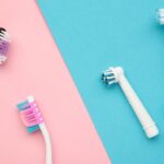 photo of manual and electric toothbrush